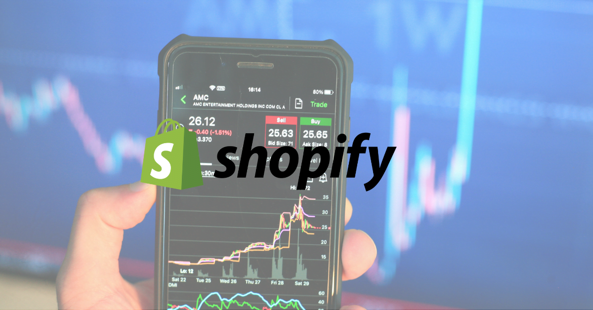 Shopify Logo In Front Of A Mobile Phone On Which Stocks Trading App Is Opened
